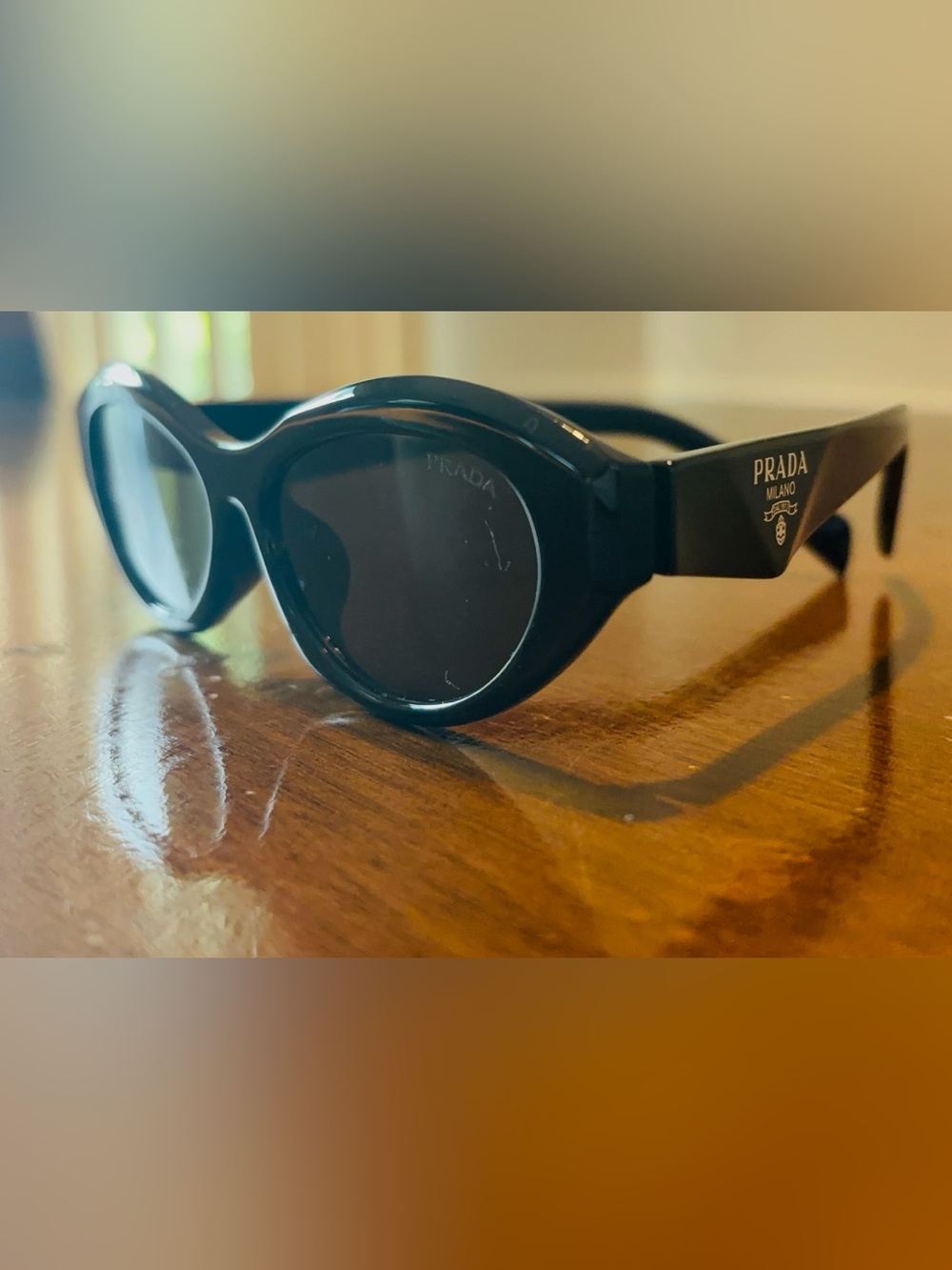 Prada Round Frame Sunglasses in Black